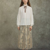 Famecoco Bow‑Tie Blouse with Balloon Sleeves