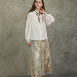Famecoco Bow‑Tie Blouse with Balloon Sleeves
