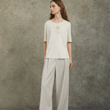 Famecoco Wide‑Leg Pants with Button Detail