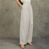 Famecoco Wide‑Leg Pants with Button Detail