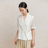Famecoco V‑Neck Blouse with Side Slits