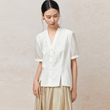 Famecoco V‑Neck Blouse with Side Slits