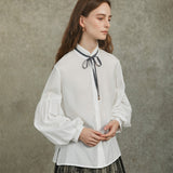 Famecoco Bow‑Tie Blouse with Balloon Sleeves