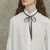 Famecoco Bow‑Tie Blouse with Balloon Sleeves
