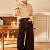 Famecoco Curved‑Leg Wide Raw Denim Pants