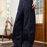 Famecoco Curved‑Leg Wide Raw Denim Pants